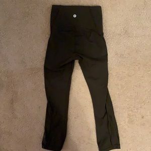 Lulu lemon leggings with mesh side. Olive color size 0